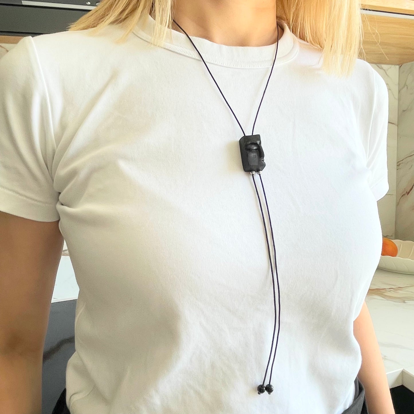 Unisex necklace with ancient bog oak carved pendant on dark brown elastic cord