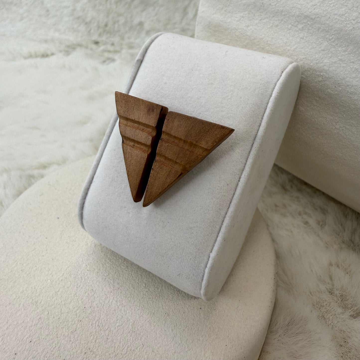 Model wearing handmade apple wood triangle earrings, lightweight and elegant for everyday wear.