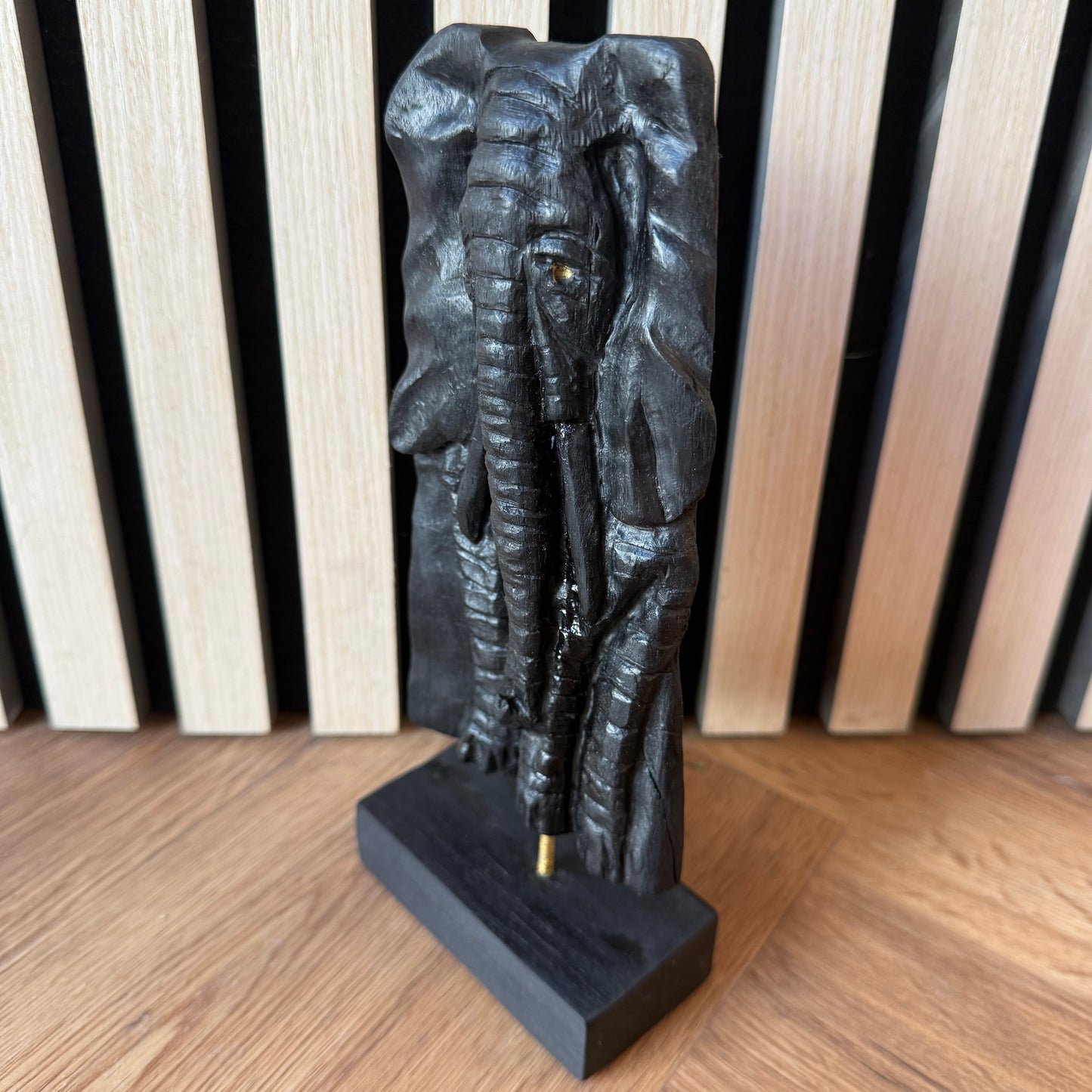 Artisan wood sculpture of elephant head – eco-friendly gift idea