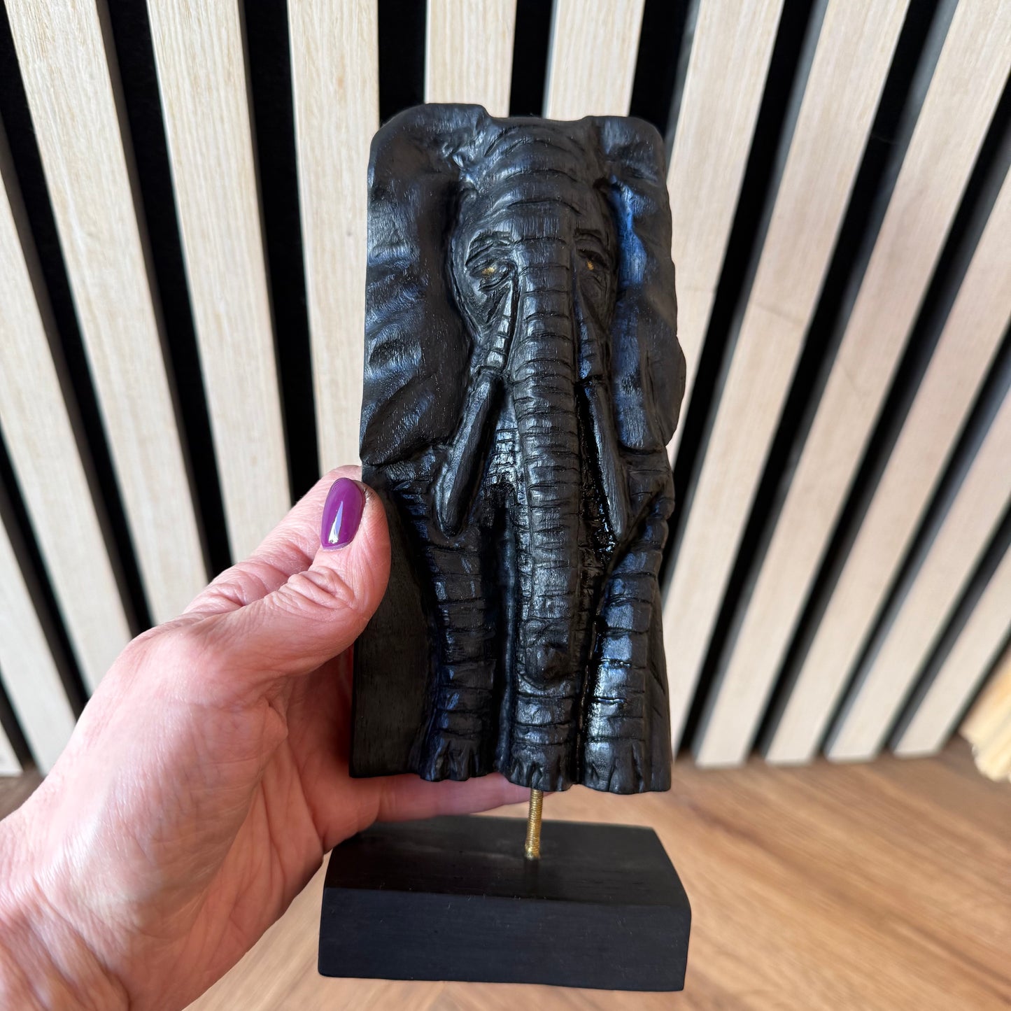 Natural wood texture on hand-carved bog oak elephant head