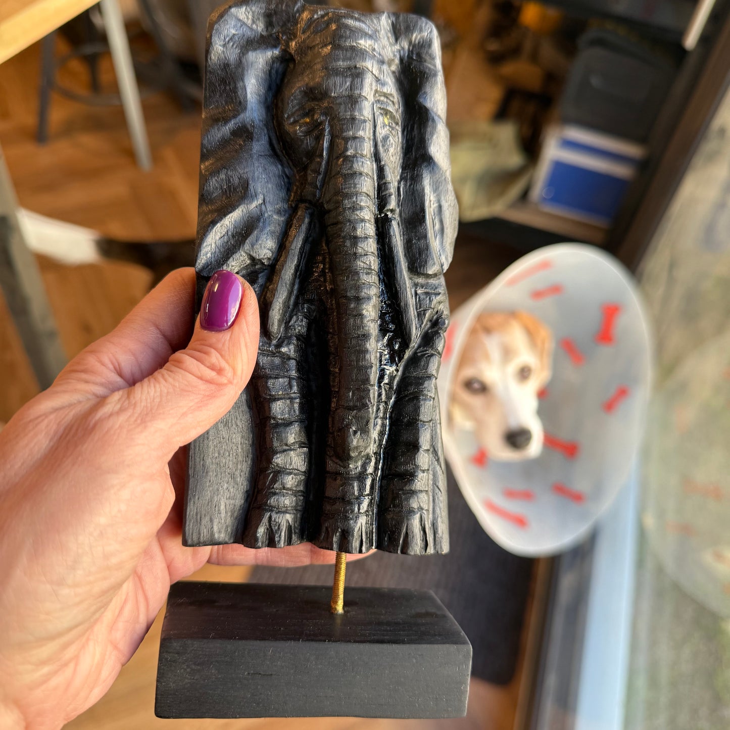 Elephant wall sculpture in fossilized wood, detailed craftsmanship