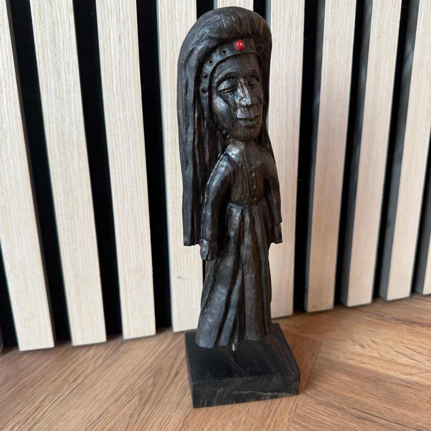 Hand-carved wooden sculpture made from ancient Irish bog oak