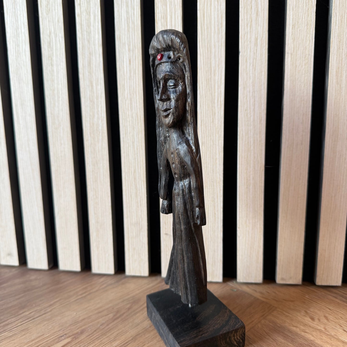 Mystical bog oak figure shaped by time and hand