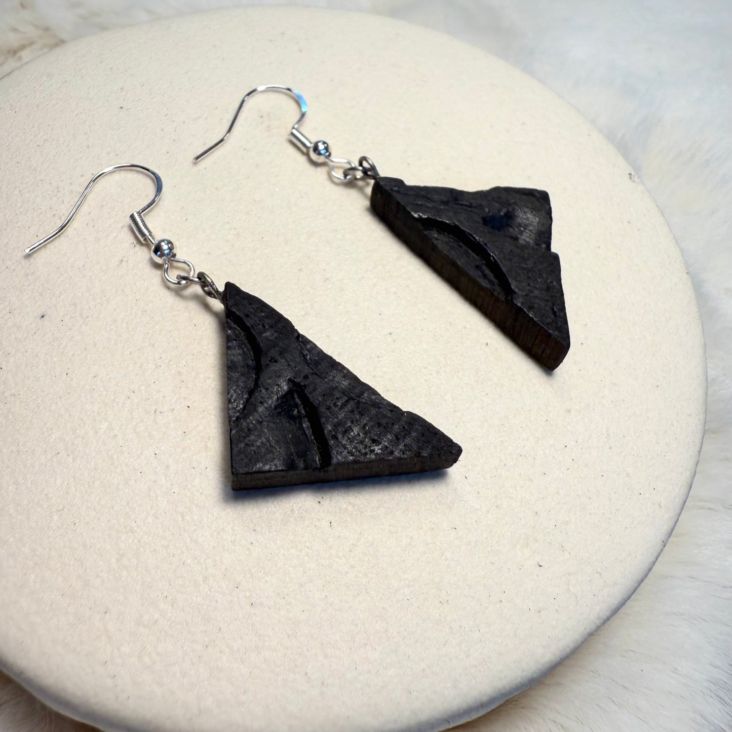 Rustic triangle earrings carved from ancient Irish bog oak.