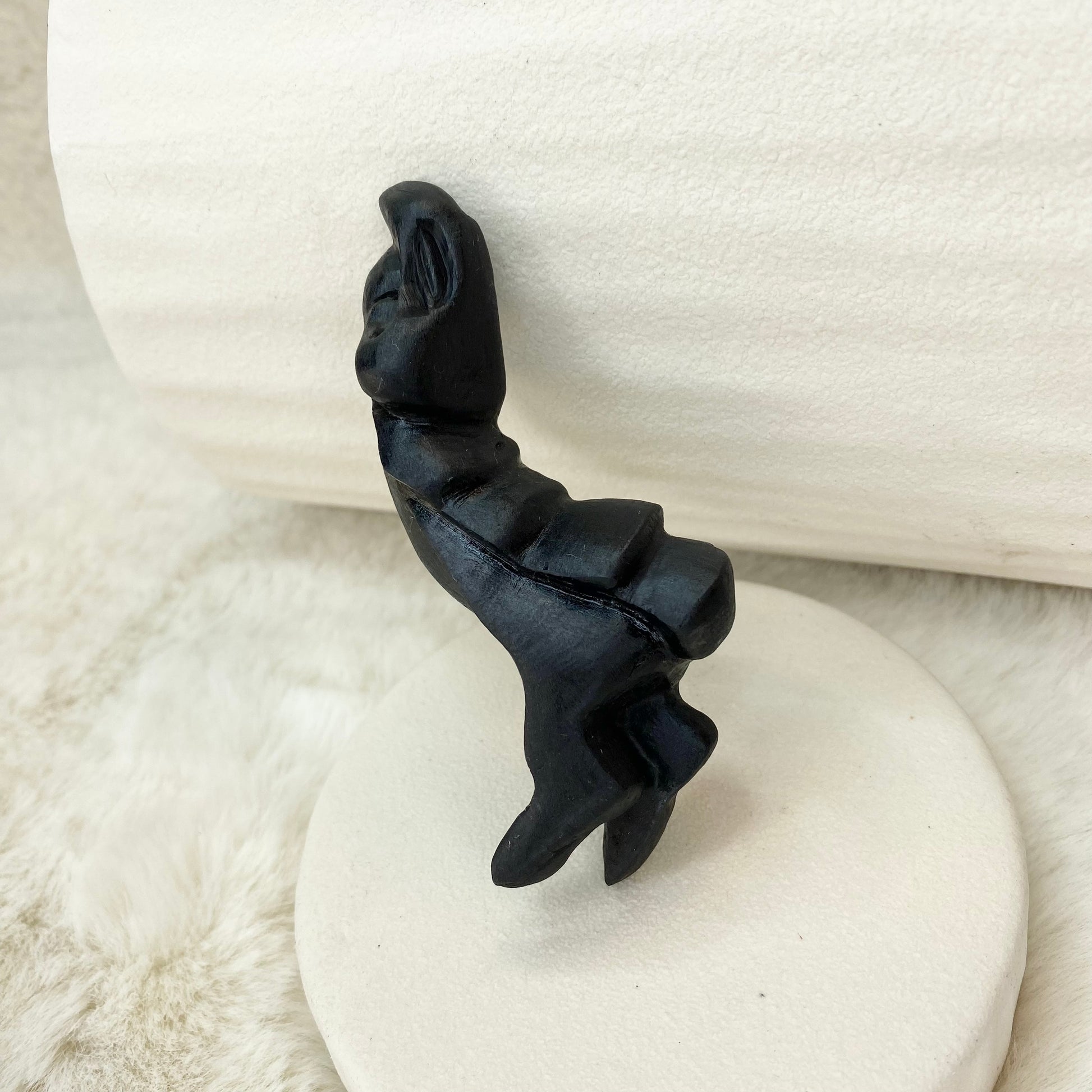 carved bog oak brooch