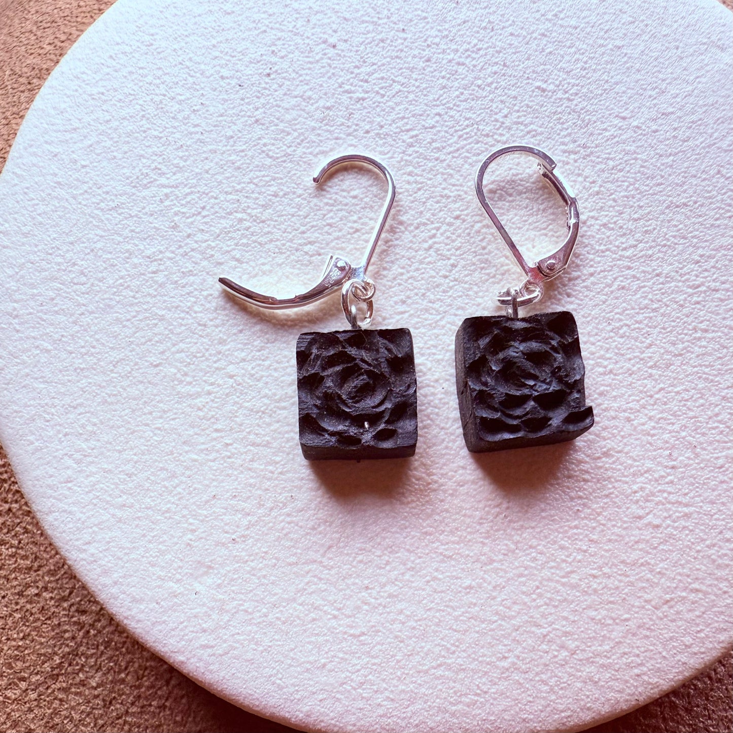 Sterling silver earrings with ancient Irish wood close-up