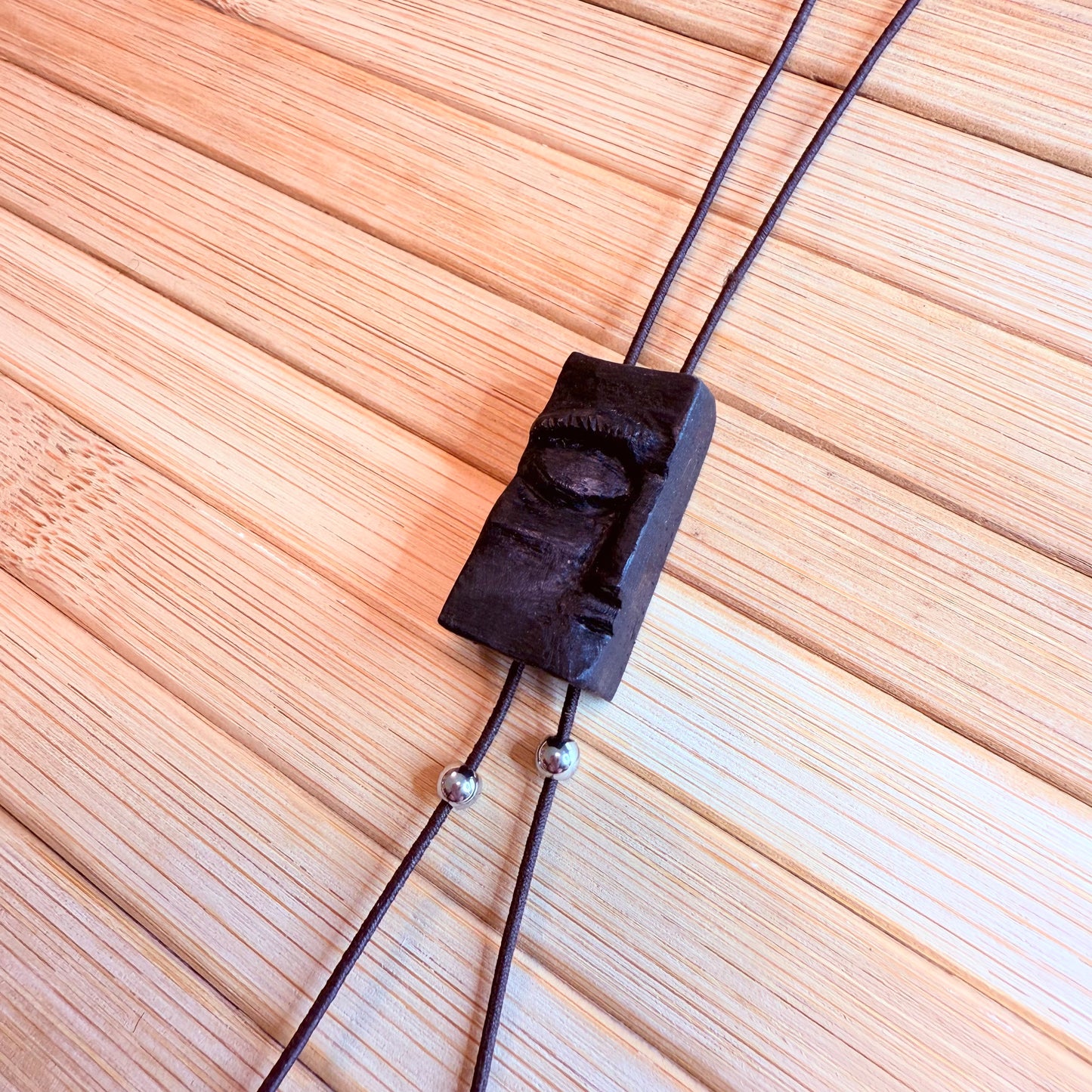 One-of-a-kind bog oak necklace with earthy textures and subtle stainless steel accents