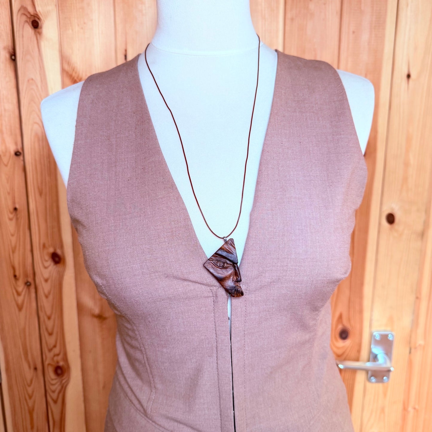 carved necklace