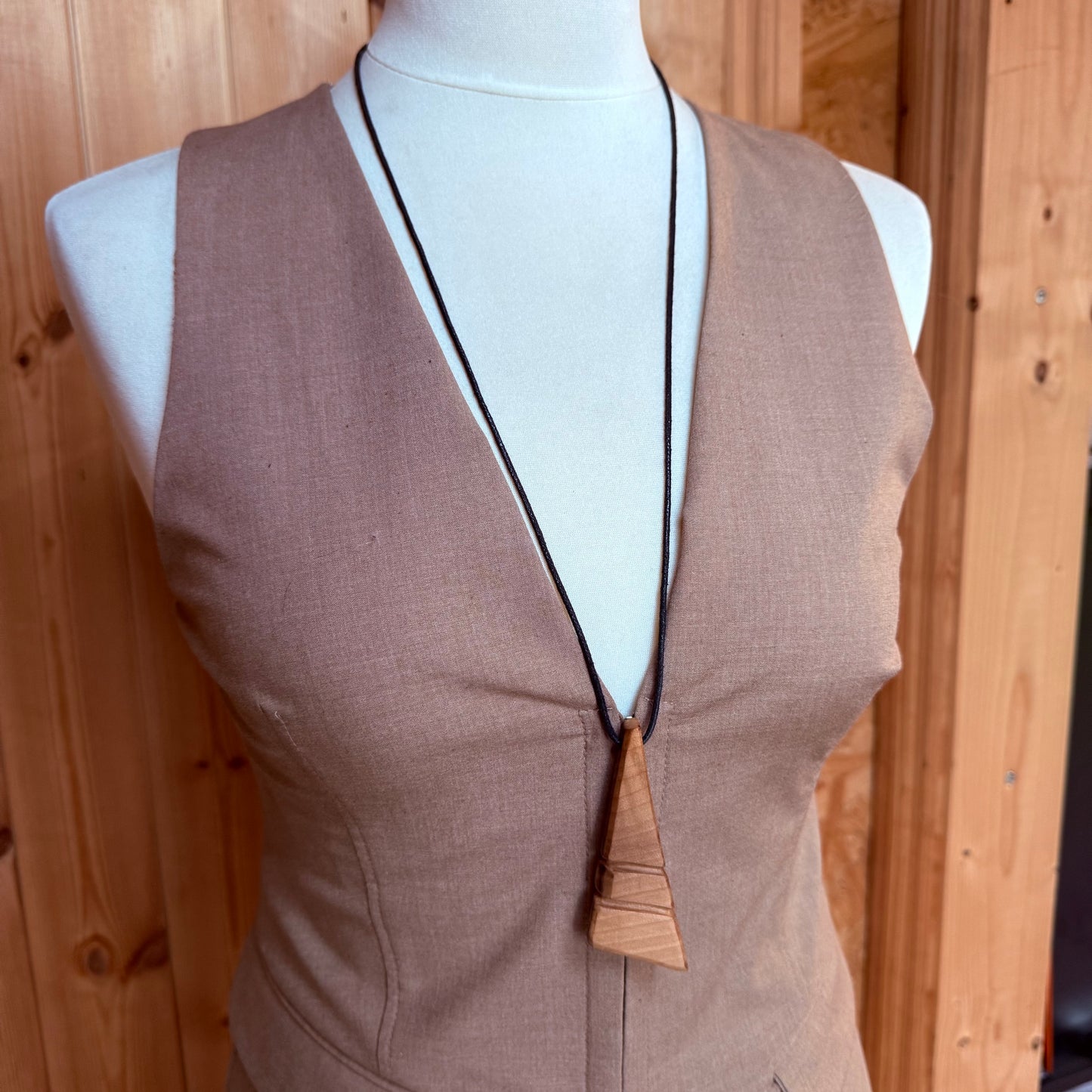 Natural wooden beads on waxed cord of adjustable handmade necklace, eco-friendly jewelry