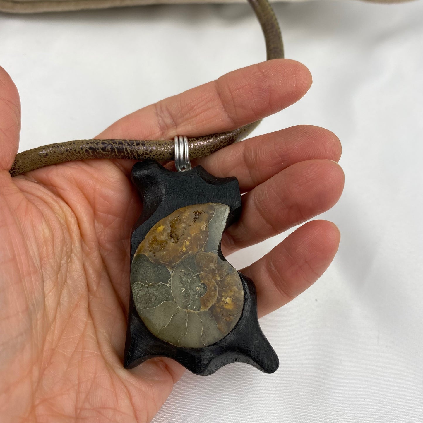 Irish Bog Oak Carved Pendant with Fossil - Handmade