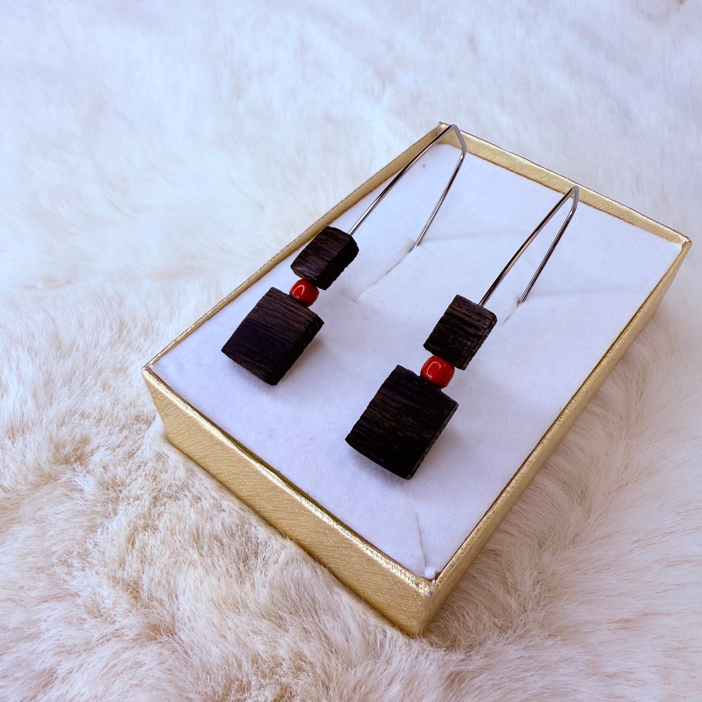 Black square earrings with red beads