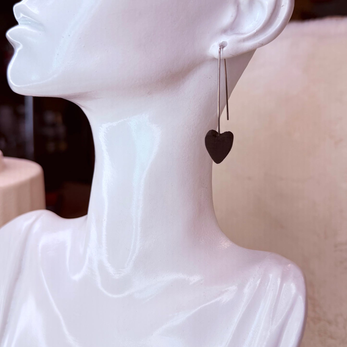 Earring with a heart detail