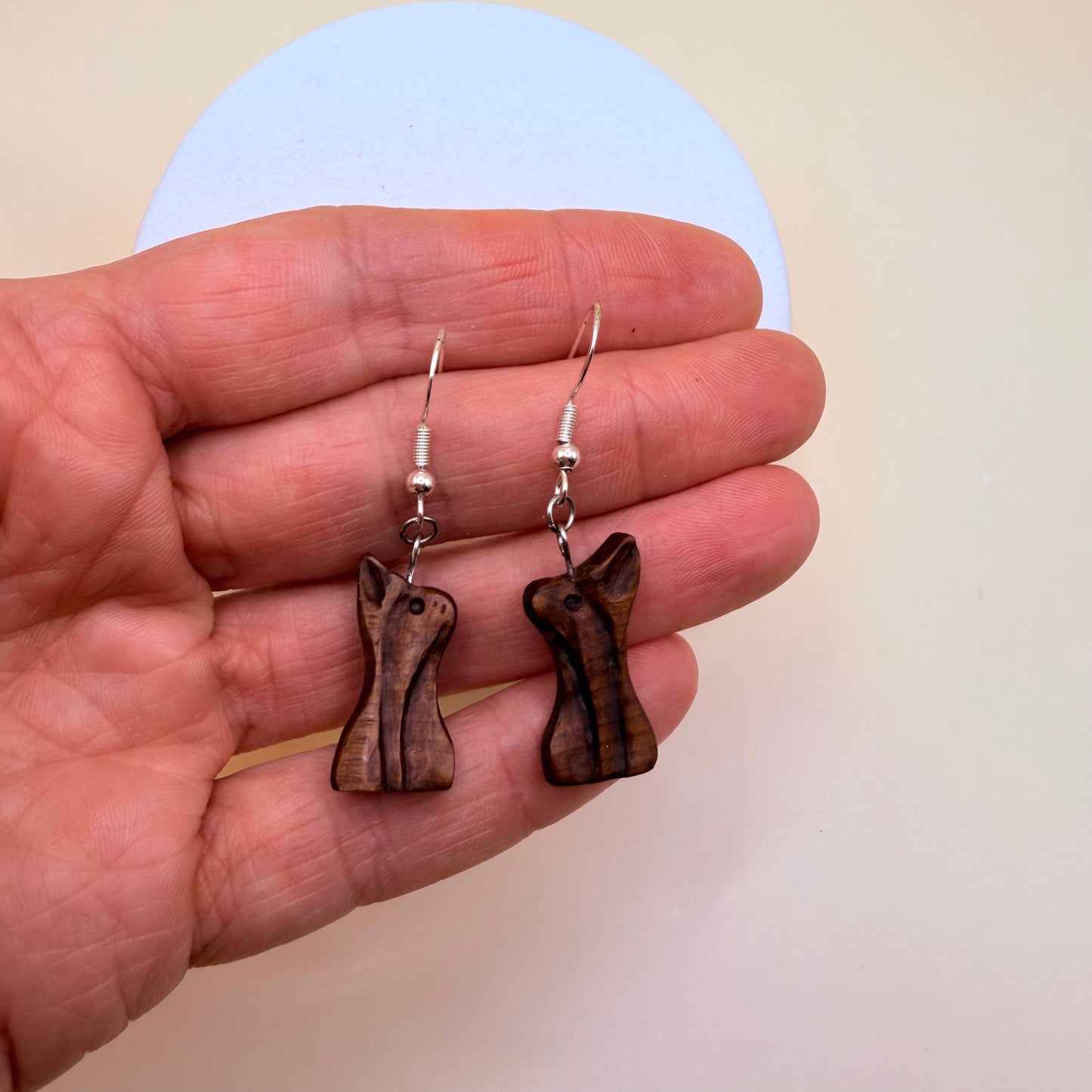 Close up of bog wood dangle earrings