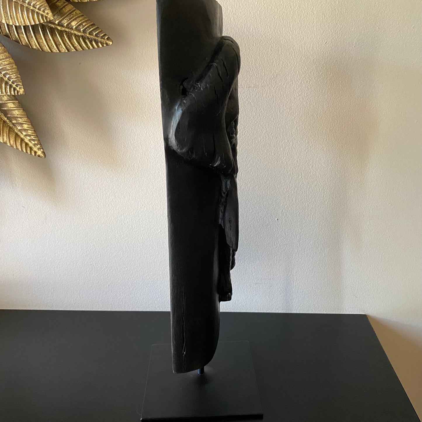 Irish Bog Oak Hand Carved Elephant Sculpture on a Black Metal Stand.