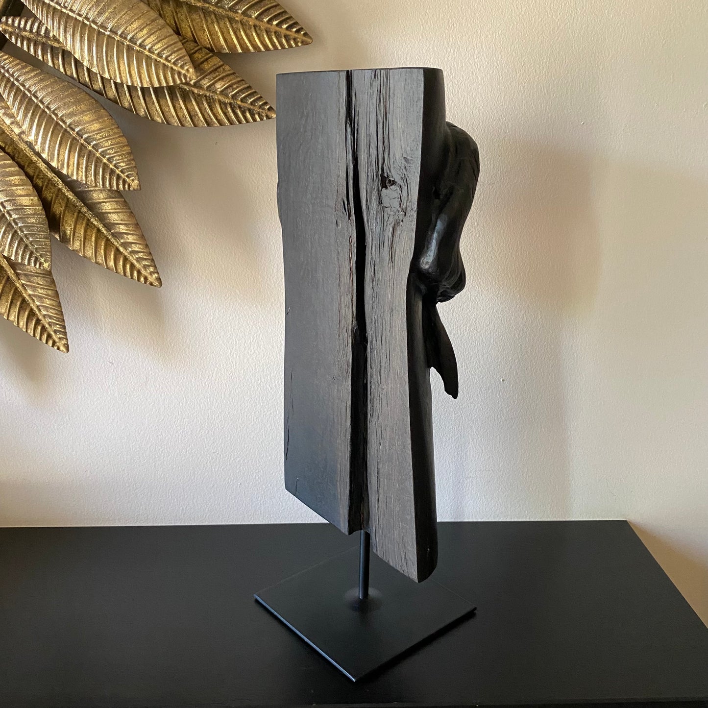 Irish Bog Oak Hand Carved Elephant Sculpture on a Black Metal Stand.