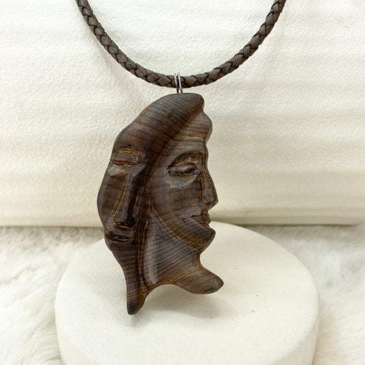 carved face necklace 