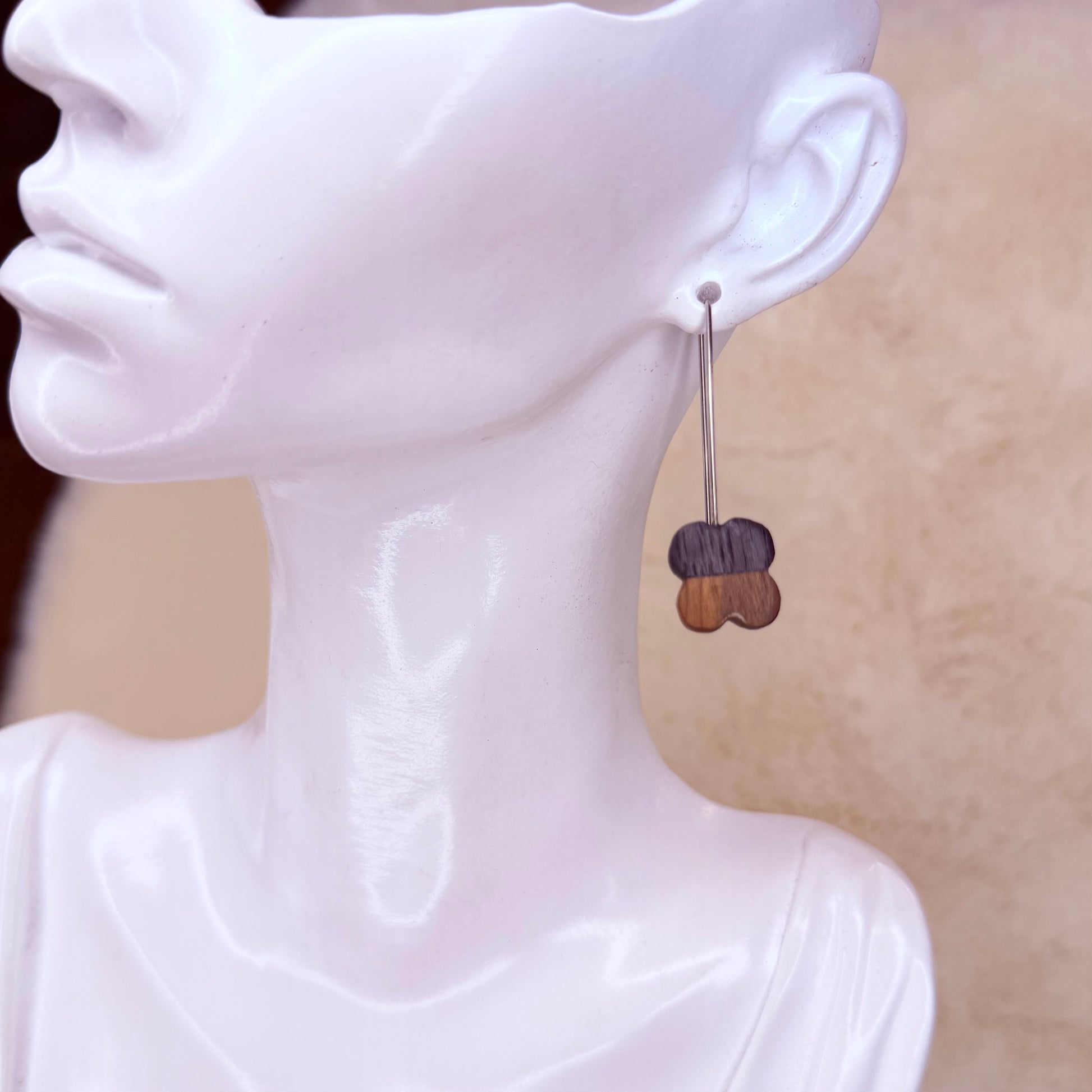 Eco-friendly earrings made from rare bog wood and stainless steel wire.