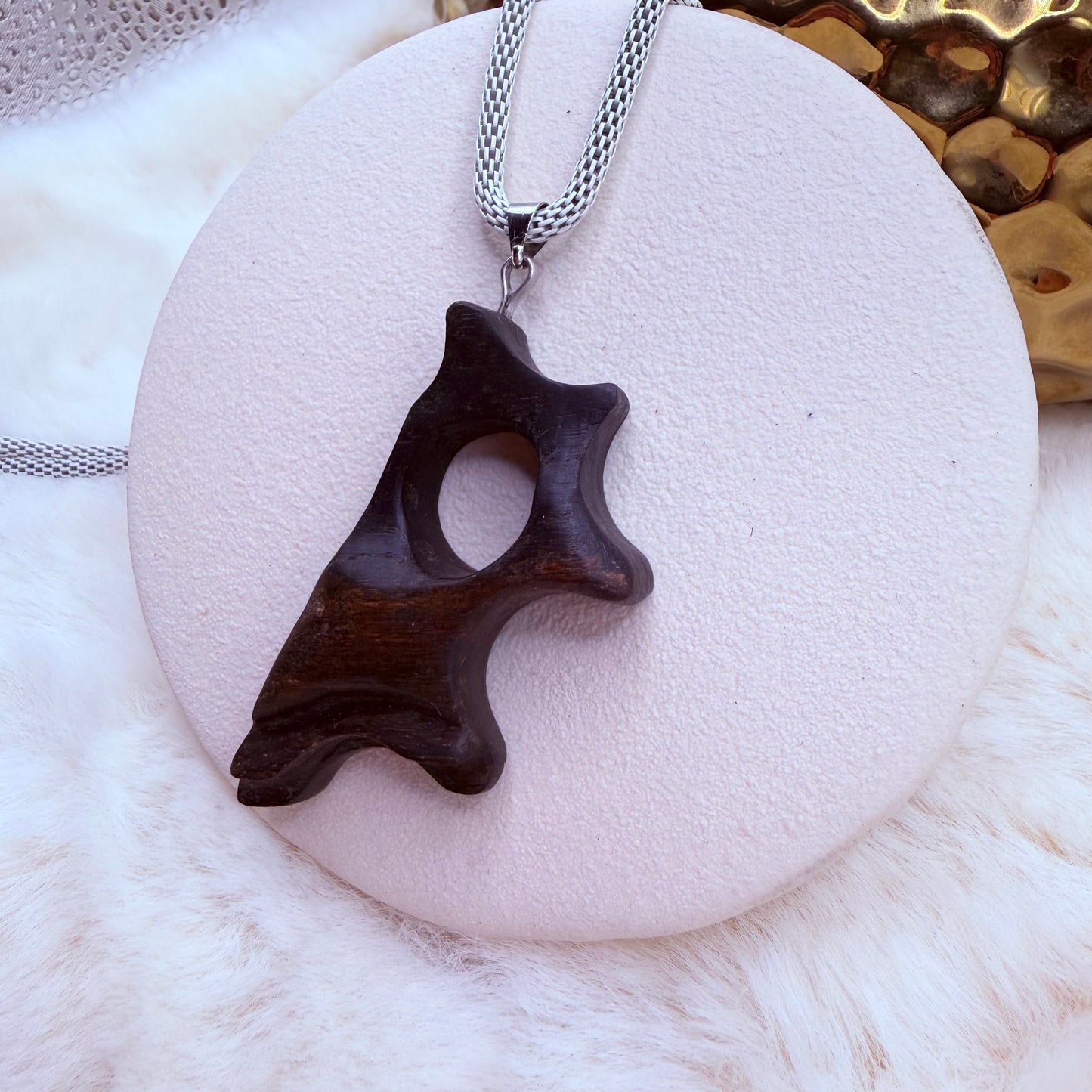 Dark wooden pendant made from ancient bog oak – natural elegant jewellery.