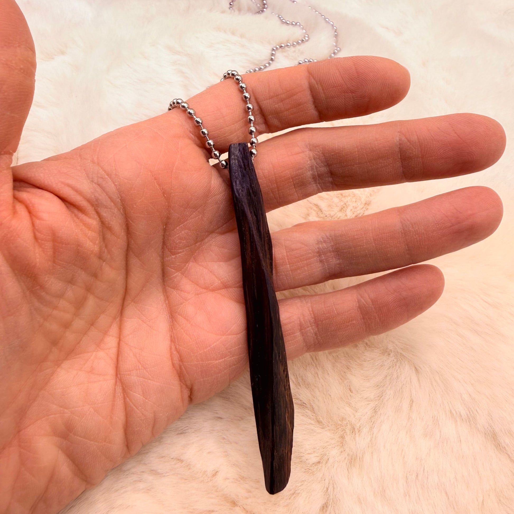 Bold bog oak pendant necklace with natural dark wood tones. Minimal, grounded, one-of-a-kind handcrafted accessory.