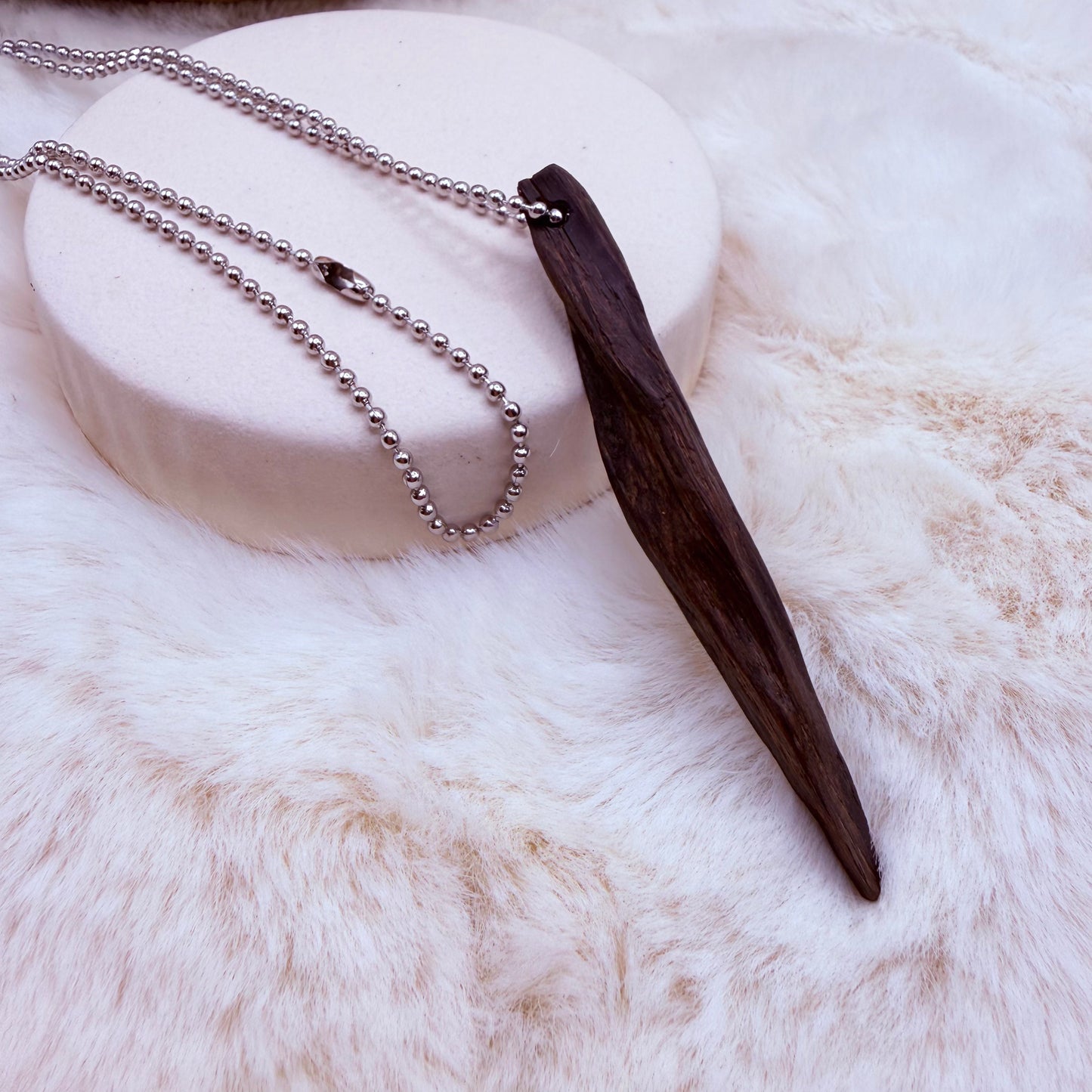 Handcrafted bog oak pendant necklace made from ancient wood. Natural, earthy, unique jewelry with meaningful character.