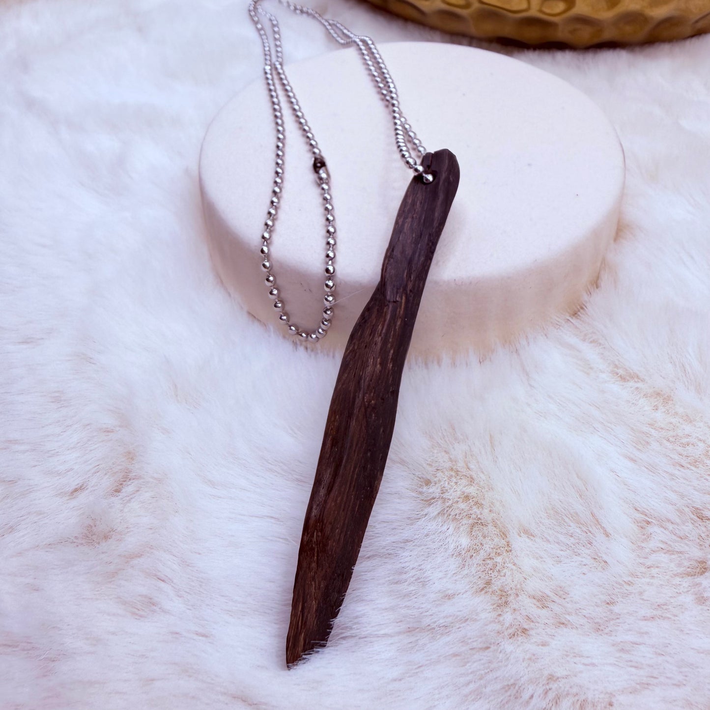 A unique handcrafted bog oak necklace made from ancient wood. A thoughtful, meaningful gift for nature lovers.