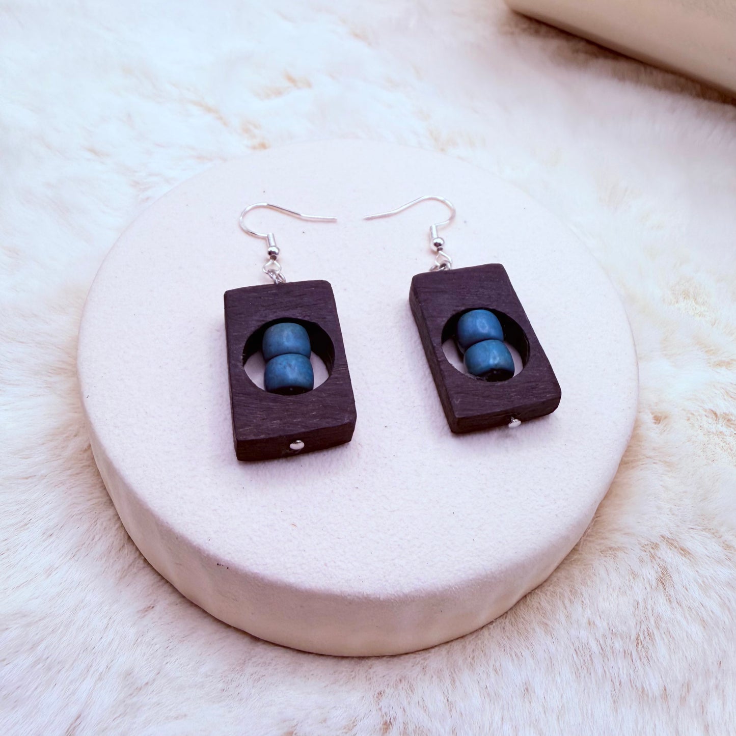 Lightweight wooden earrings with blue stone