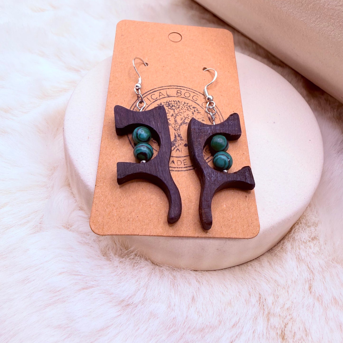 Unique artisan bog oak earrings with natural malachite detail