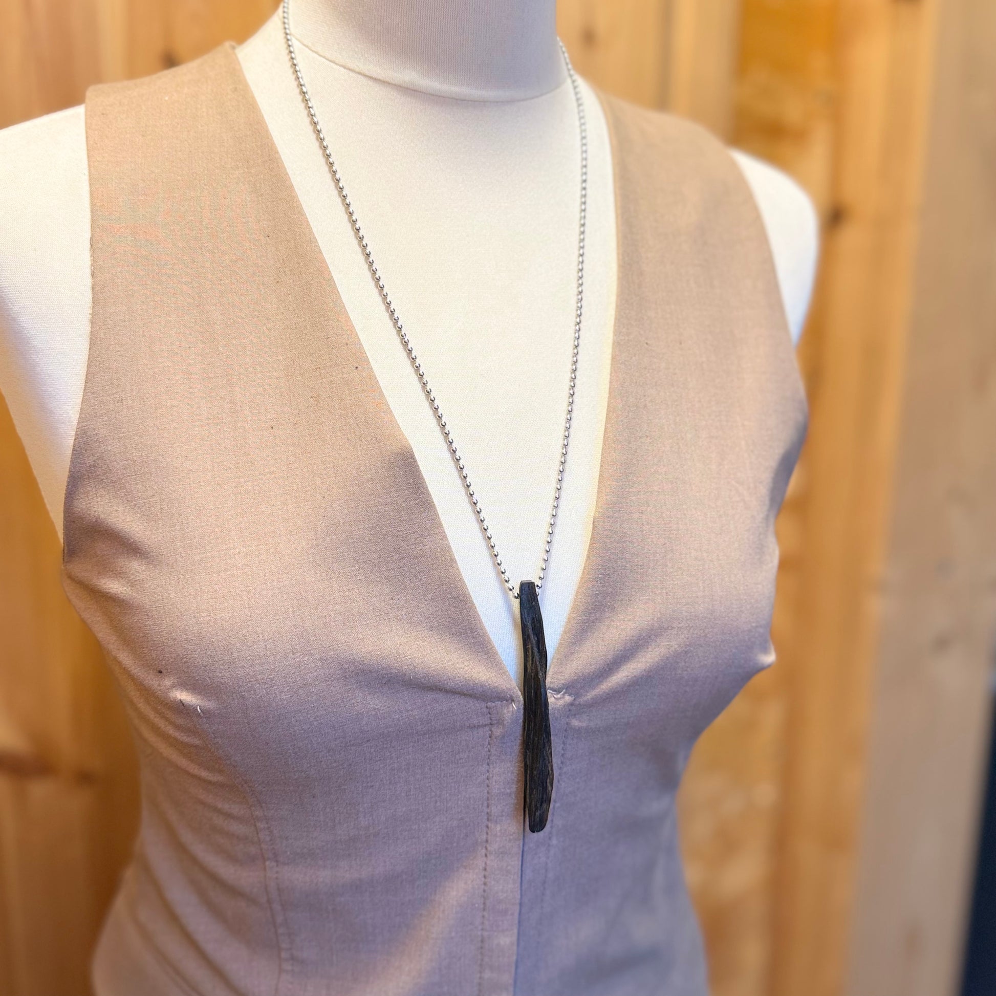 Handcrafted bog oak pendant necklace made from ancient, naturally preserved wood. Earthy, meaningful jewelry for everyday wear.