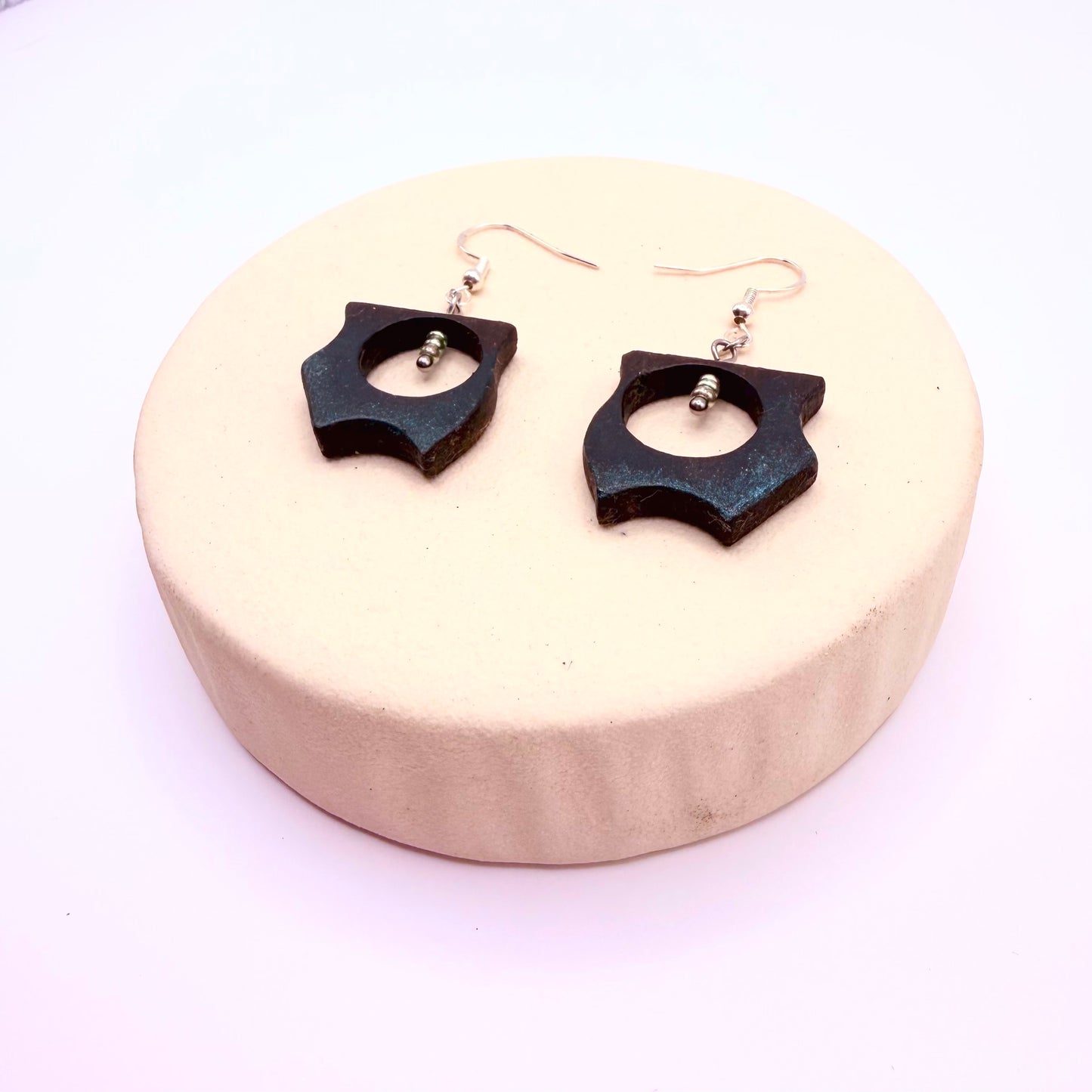 Modern minimalist earrings made from ancient bog oak and stainless steel