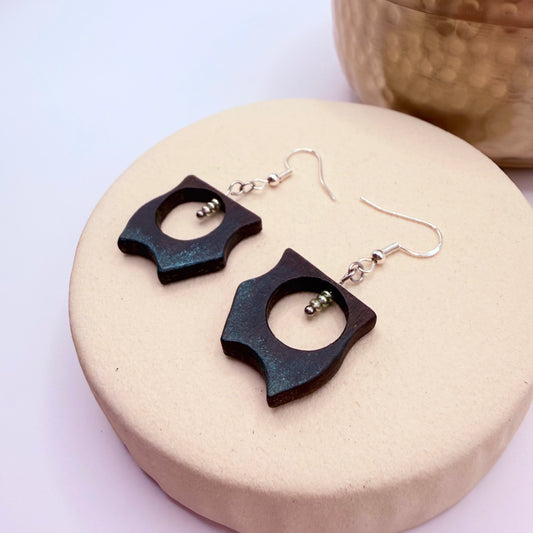 Handmade bog oak dangle earrings with stainless steel and subtle green accent on edges