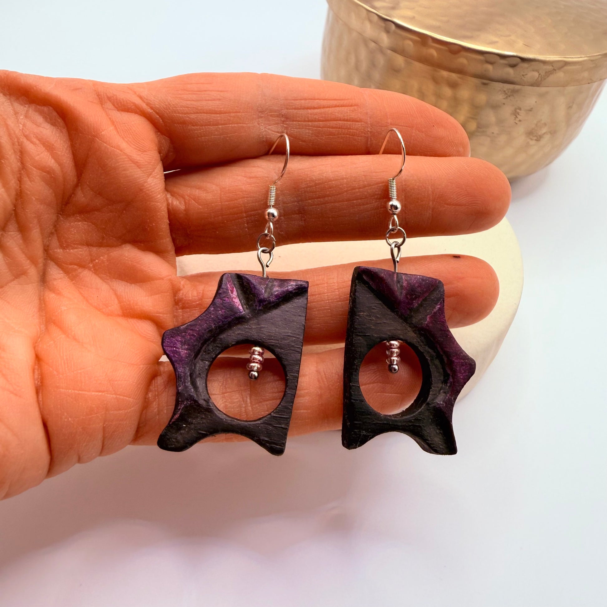 Artisan bog oak earrings with dark wood grain detail