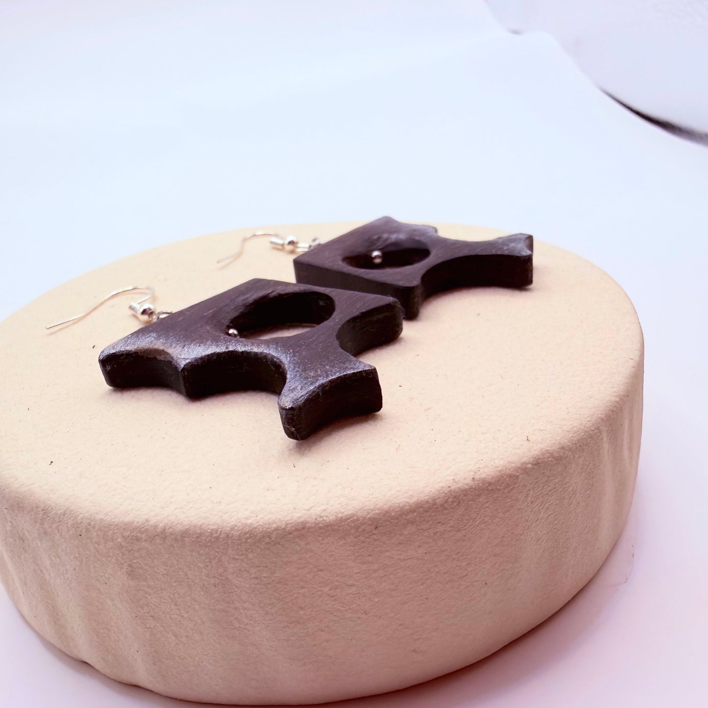 Handcrafted bog oak earrings in modern sculptural design