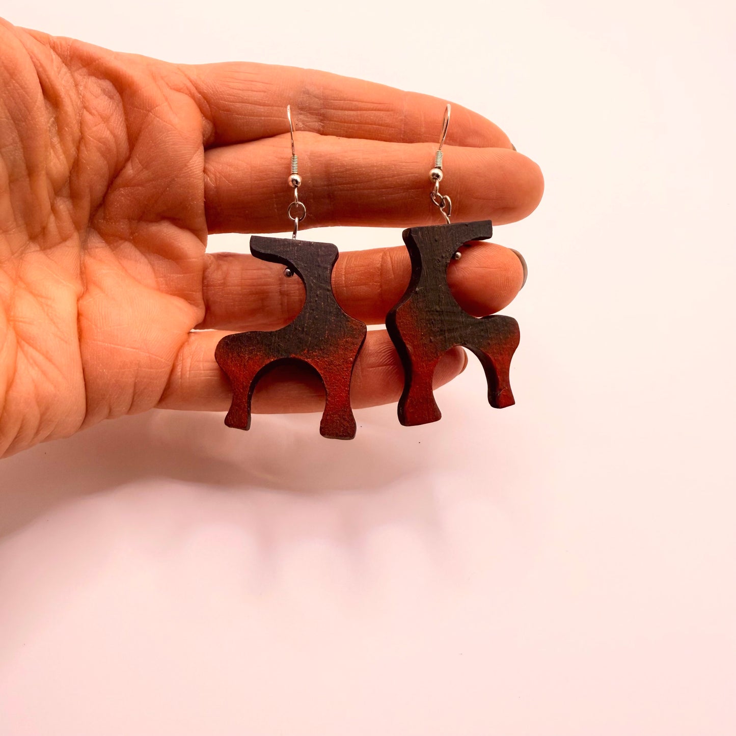 Contemporary art jewelry earrings made from bog oak wood