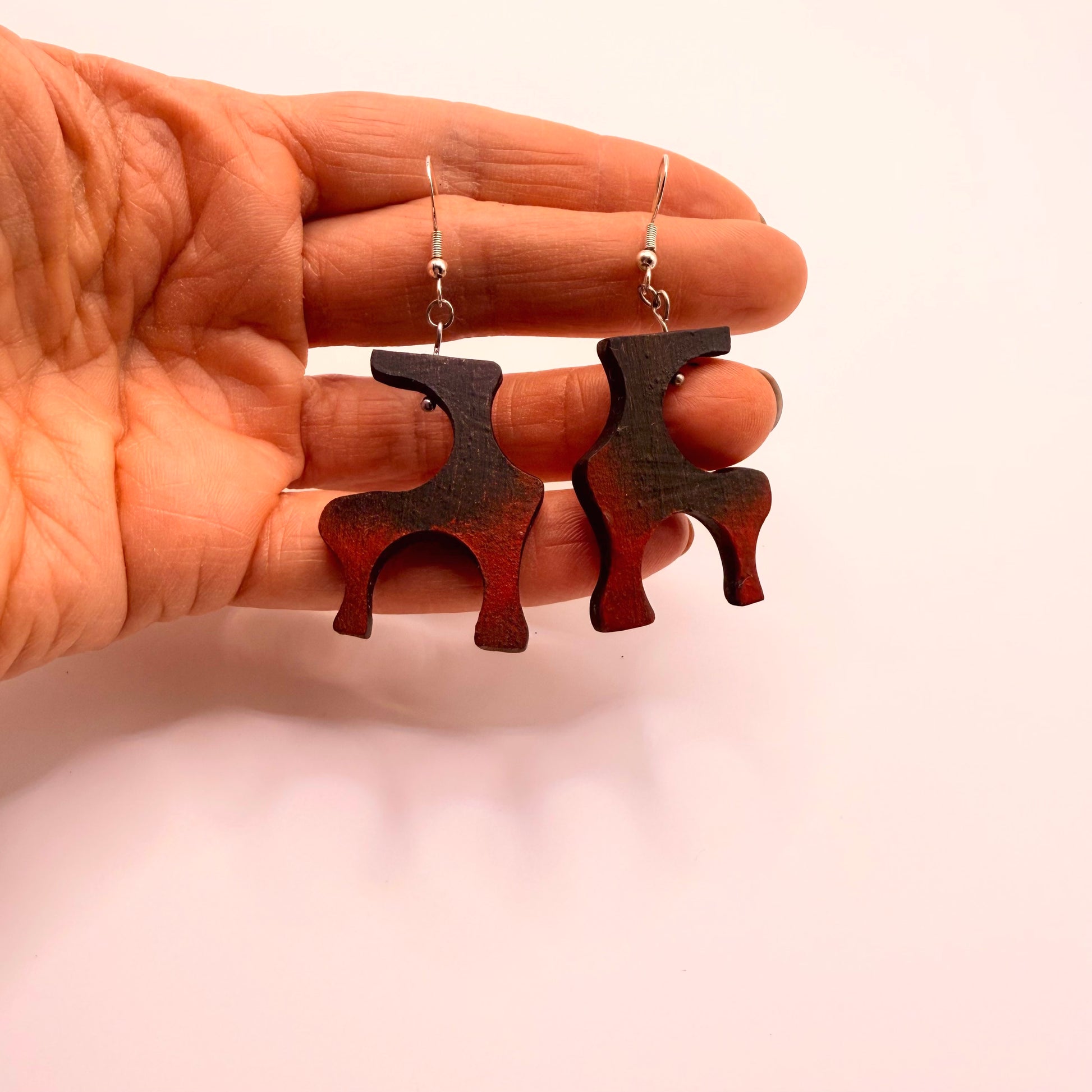 Contemporary art jewelry earrings made from bog oak wood