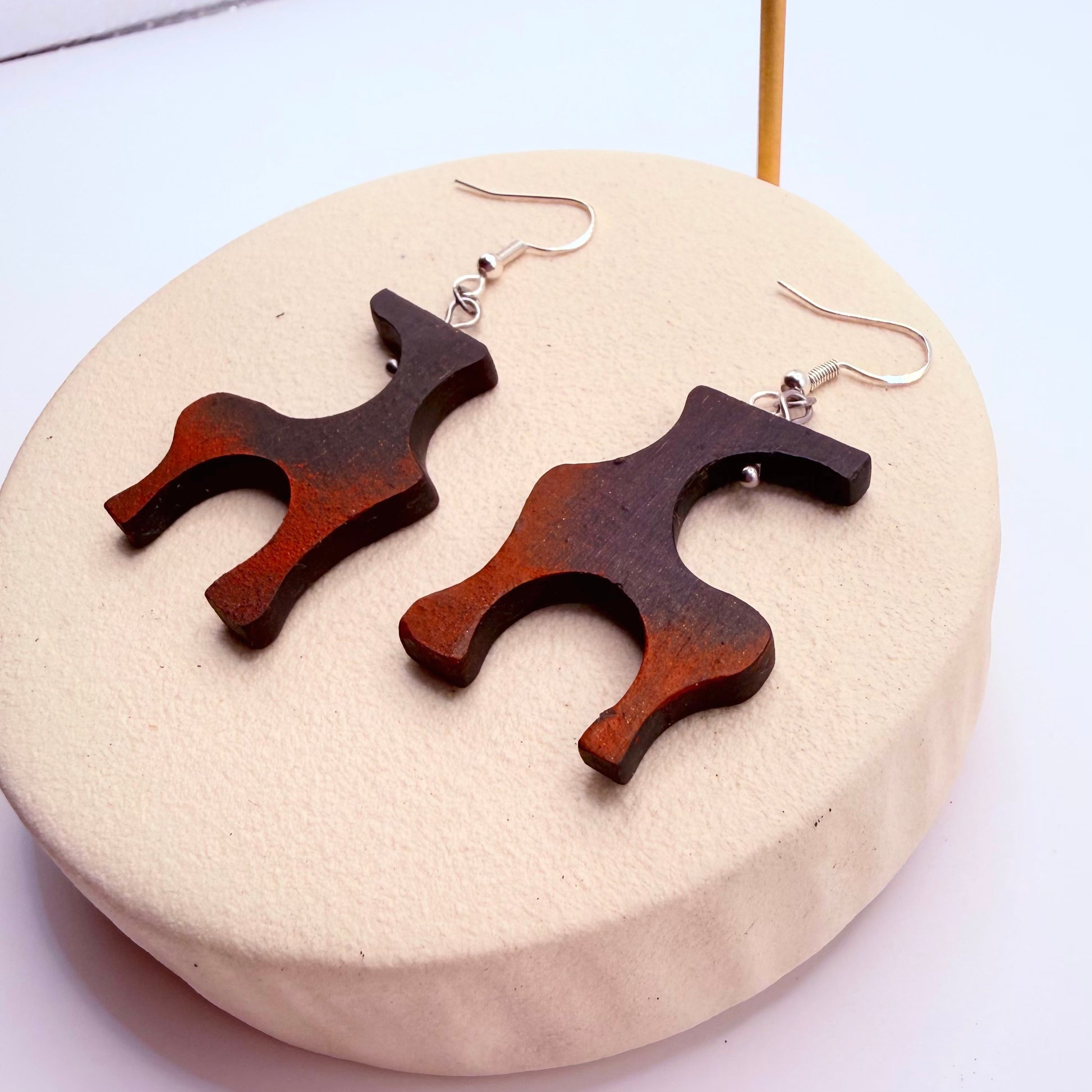 Minimalist wooden earrings crafted from rare bog oak