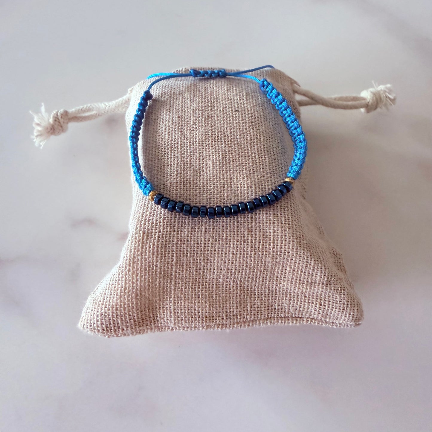 Blue Hematite bracelet with adjustable fit.