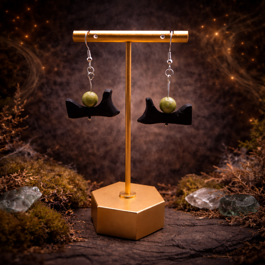 Jewelry stand with earrings on a dark, natural background