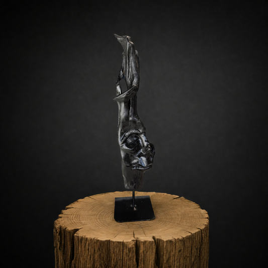Hand-carved abstract face sculpture in ancient Irish bog oak on metal stand, one-of-a-kind artwork