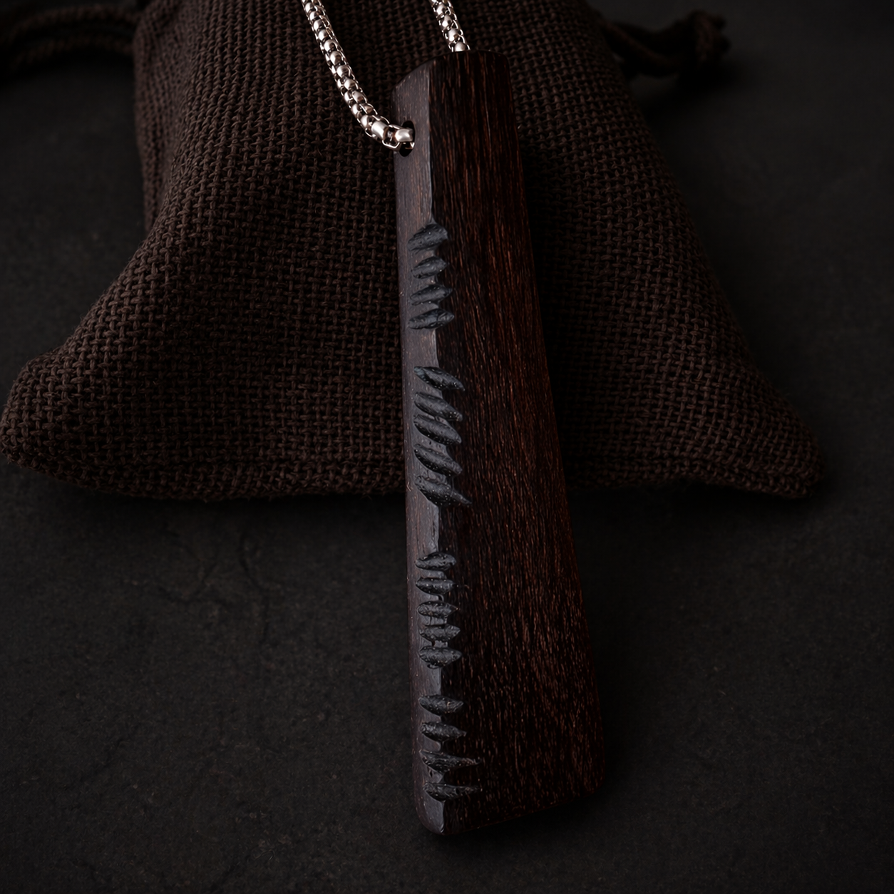 bog oak ogham pendant necklace stainless steel chain close up