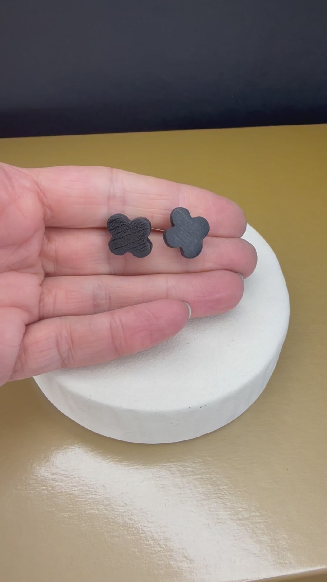 Elegant dark wood bog oak stud earrings with clover design, perfect for nature-inspired jewelry lovers.