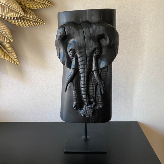 Irish Bog Oak Hand Carved Elephant Sculpture on a Black Metal Stand.